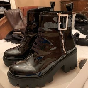 Black patent leather military-inspired boots